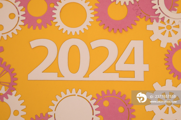 Year 2024 on the background of paper gears