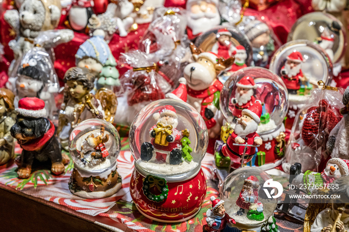 Traditional Souvenirs snow globes and toys Santa Claus Dolls At European Winter Christmas Market Souvenir