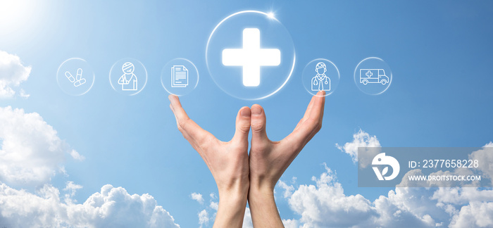 Businessman hold virtual plus medical network connection icons. Covid-19 pandemic develop people awareness and spread attention on their healthcare.Doctor,document,medicine,ambulance,patient icon.