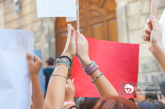 Fridays for future: students hands showing  banners and boards