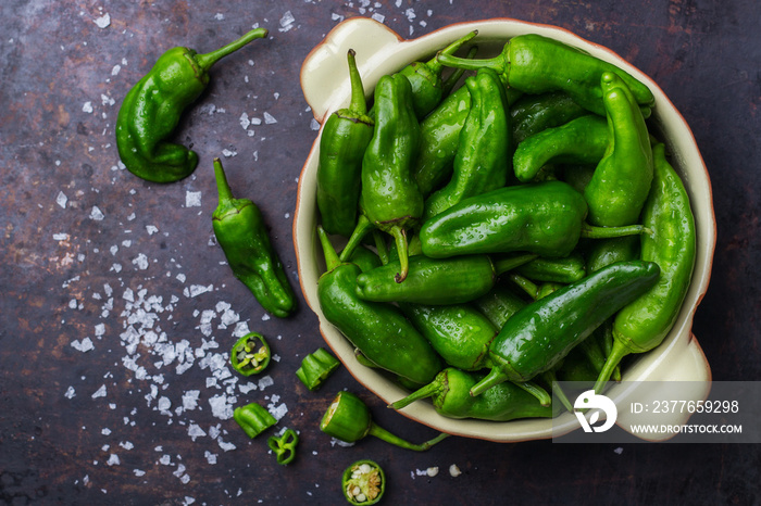 Raw green hot mexican peppers jalapeno pimientos padron spanish tapas