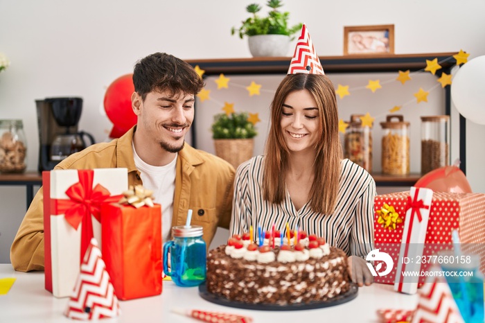 Mand and woman couple having birthday celebration at home