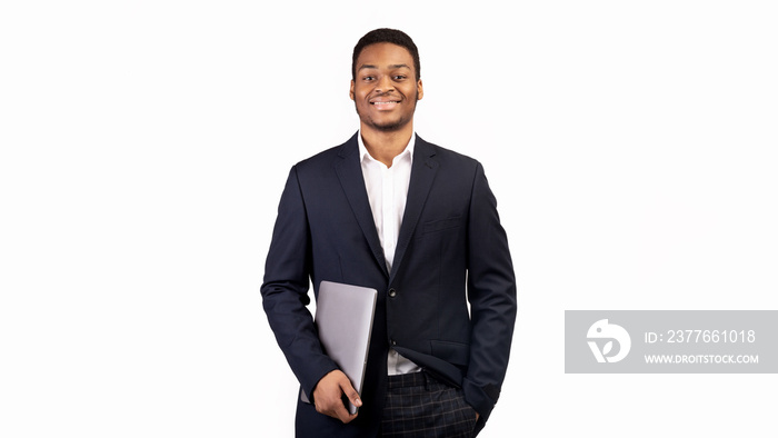 Handsome afro guy holding laptop on white background