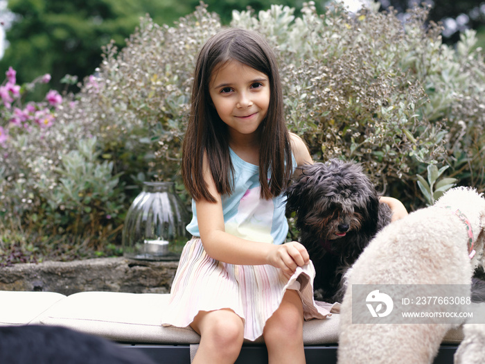 Portrait of girl with dogs