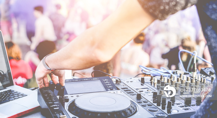 Dj mixing outdoor in after disco party on the beach