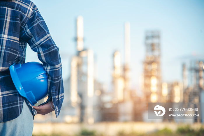 Electrician Technical operator worker hardhat blue work helmet Engineering. engineer woman hand holding Blue hard hat. Electrician woman worker oil petro industry safety at work blue worker helmet.