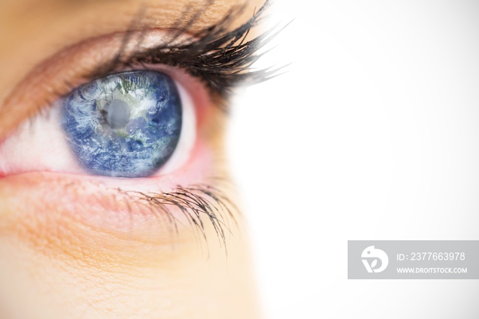 Composite image of close up of female blue eye