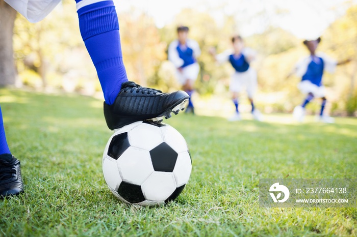 Close up view of balloon under football boots