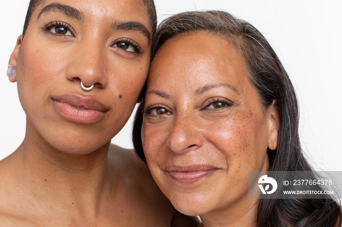 Studio portrait of smiling women