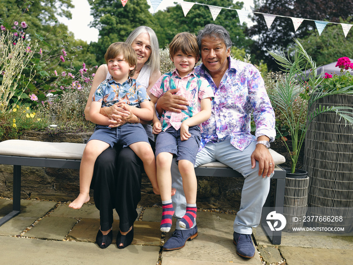 Portrait of grandparents with grandsons