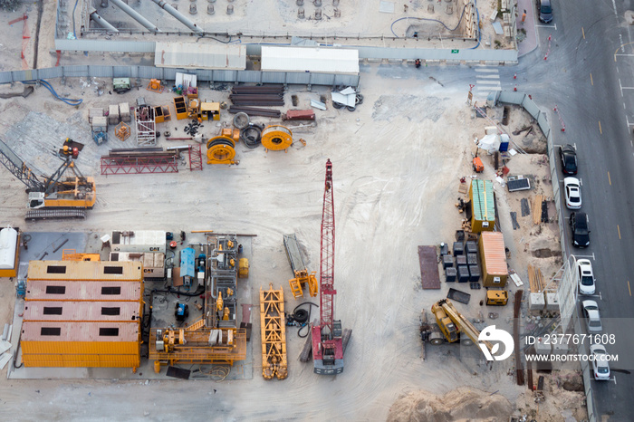 Aerial shot of a big urban construction site, industry and architecture concepts