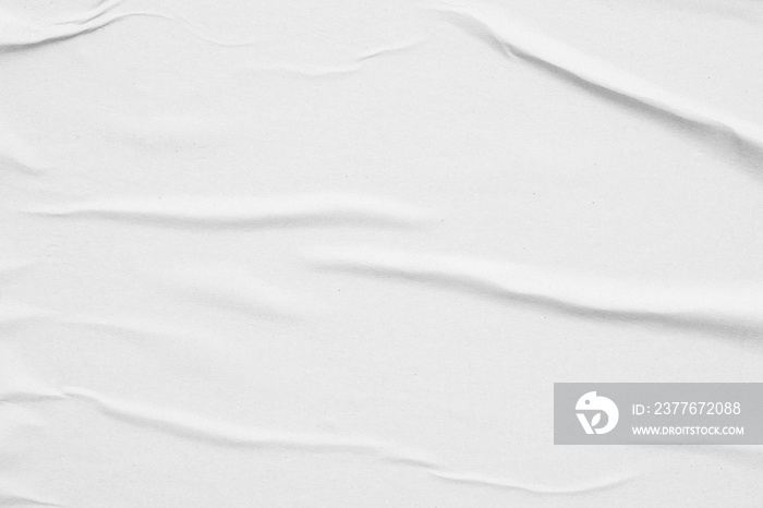 Blank white crumpled and creased paper poster texture background