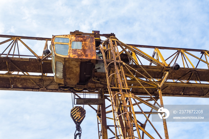 Old construction crane. The rear portion of a construction crane.