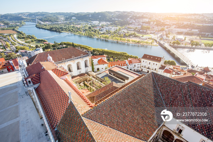 Aerial cityscape view on the old town of Coimbra during the sunset in the central Portugal