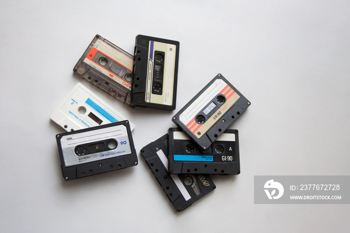 Retro audio cassette tapes isolated on white background from a high angle view