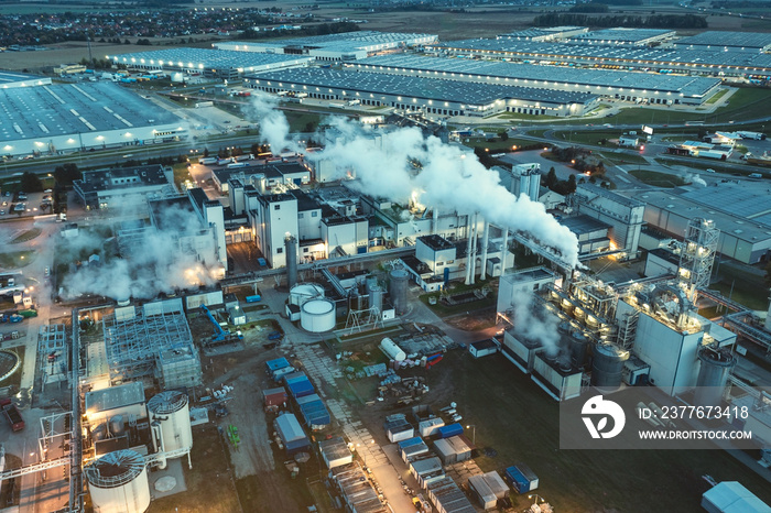 Top view at night on a large number of industrial enterprises for the refining of oil and the production of gasoline.