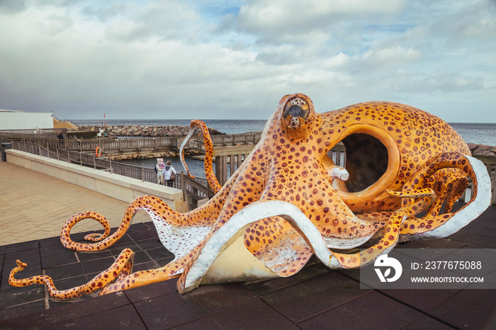 Huge decorative octopus on the playground in a Danish port city Grenaa Havn