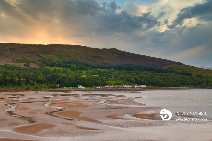 Landscape of Applecross village and beach at golden hour. This village is on the North Coast 500 route in the Scottish Highlands.