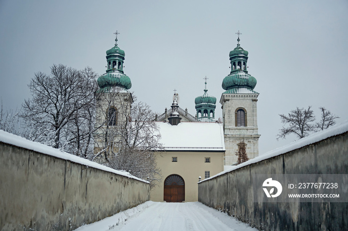 main gate of Camaldolese monastery in Bielany, Krakow, Poland on winter day