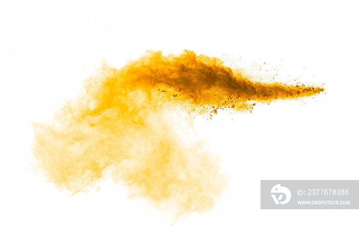 Orange powder splattered on white background.Abstract design of color dust cloud.