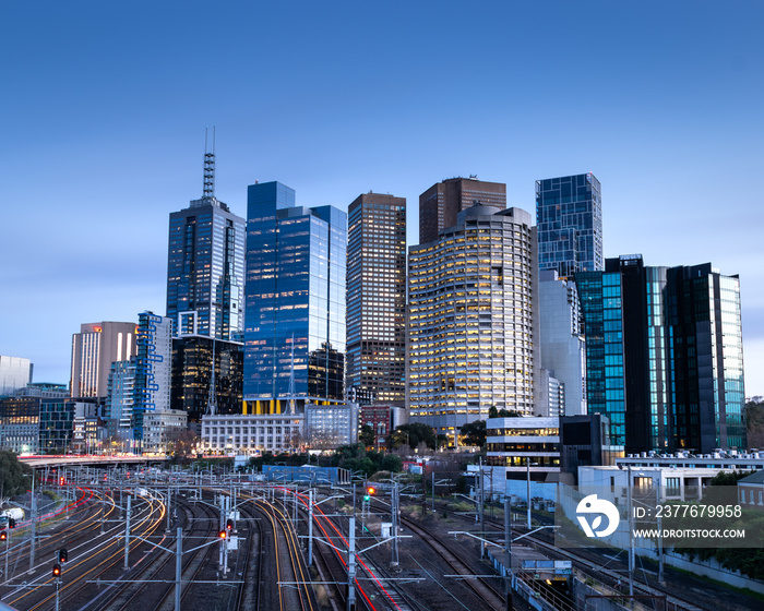 Light trails on the train tracks leading us towards the Melbourne skyline.