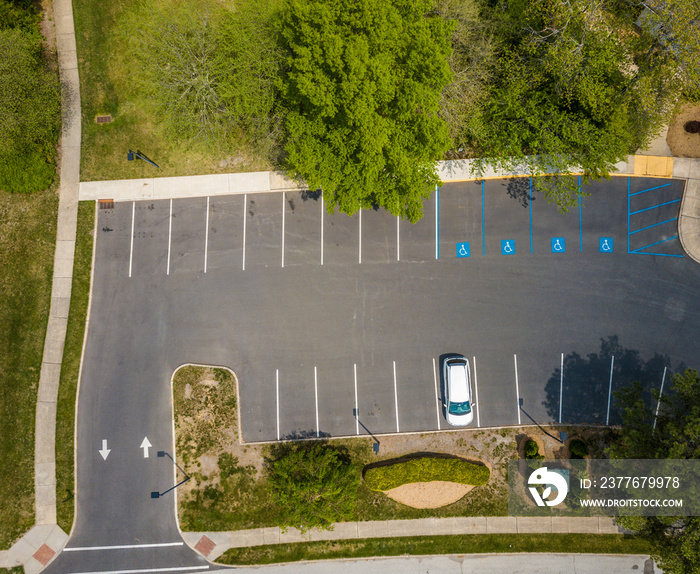 One car parked at the small parking lot