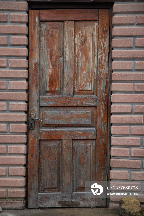 Old wooden door. Old wooden door with old varnish.  Exfoliating varnish