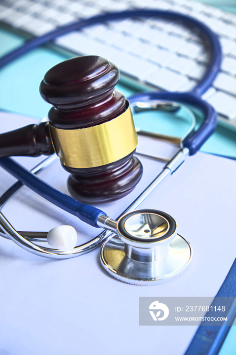 Gavel and stethoscope. medical jurisprudence. legal definition of medical malpractice. attorney. common errors doctors, nurses and hospitals make.