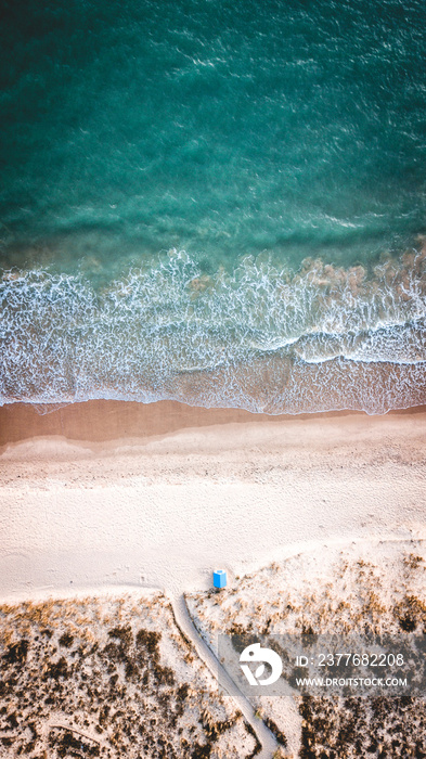 French west coast beach sunny day with waves. Aerial photo