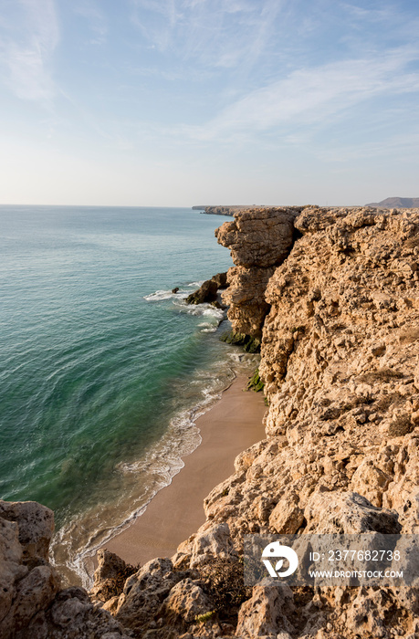 View over cliffs  and Gulf of Oman at the wild coast of Ras Al Jinz, Sultanta of Oman