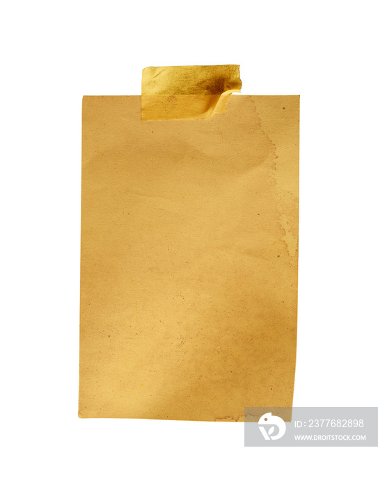 Golden note paper isolated with tape