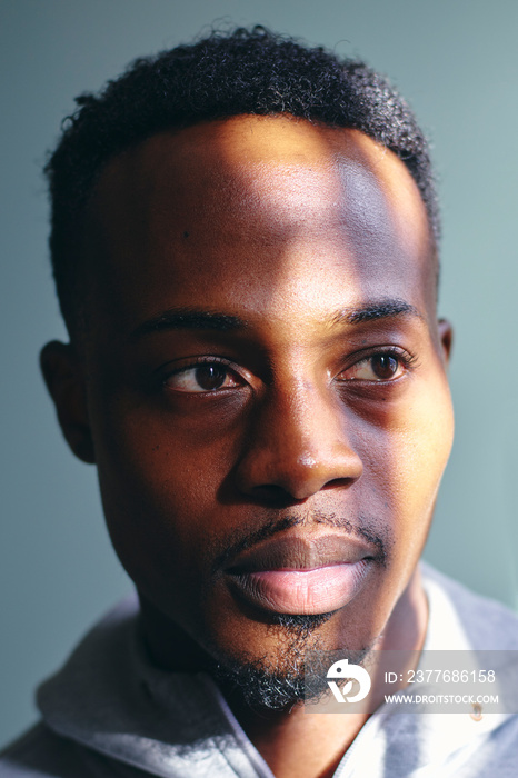 Portrait of mid adult man in sweatshirt