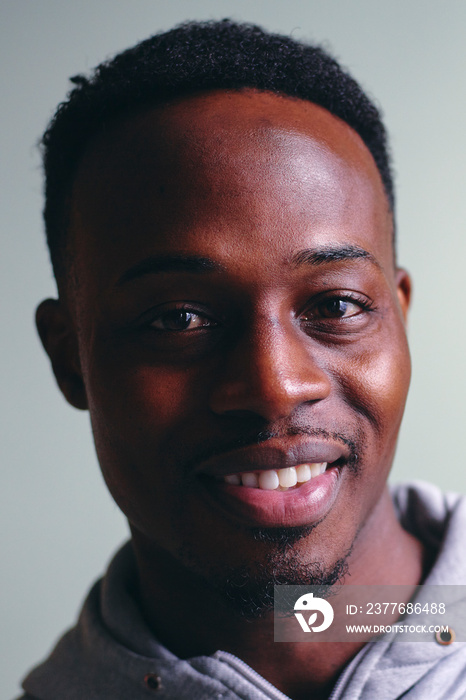 Portrait of mid adult man in sweatshirt