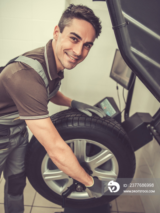 Handsome auto service worker