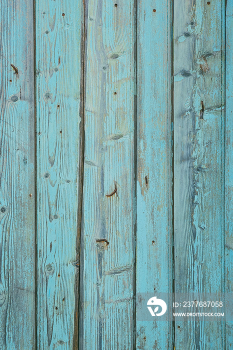 Old blue painted wooden tiles, vintage boards. Rough aged wood panels, texture background.