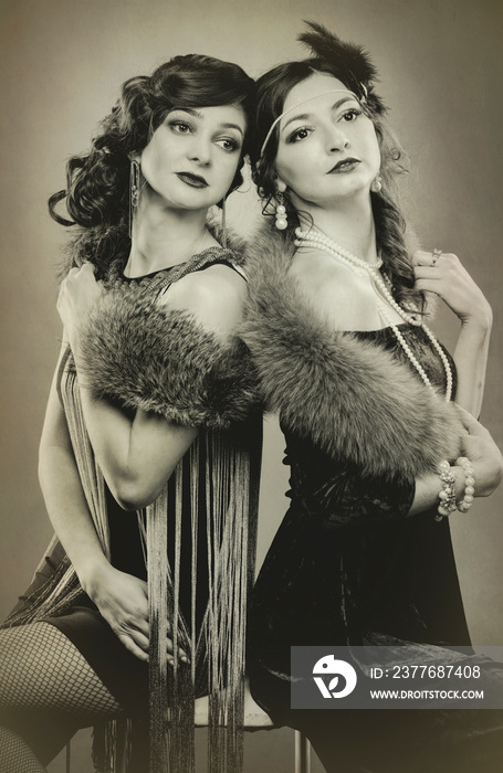 Black and white photograph of beautiful women in the style of 20s or 30s.