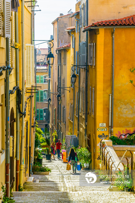 A narrow street in the Le Panier district of Marseille, France