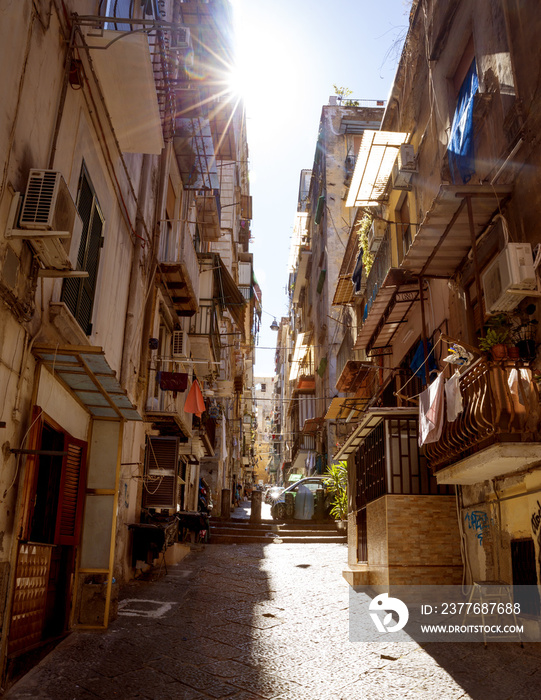 Narrow street in old town of Naples city in Italy