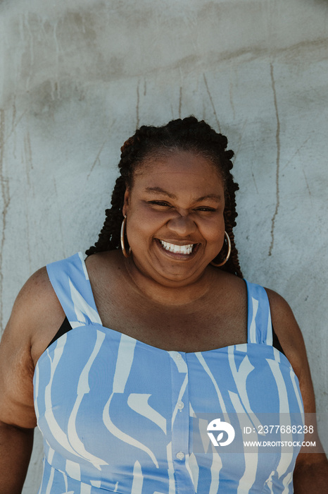 closeup of African American woman in blue dress