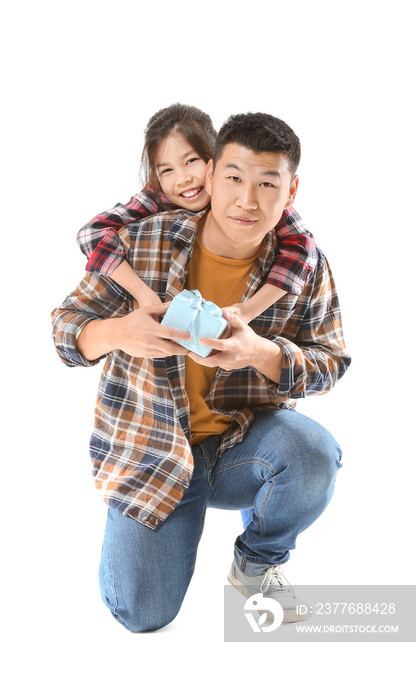 Little Asian girl greeting her father on white background