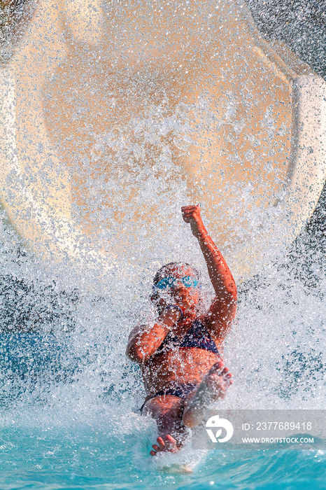 jump out of the water slide in the pool