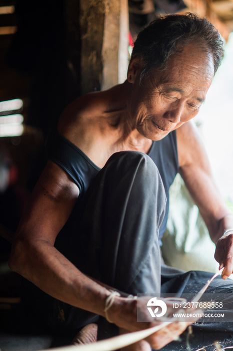 Senior man working, Shan State, Keng Tung, Burma