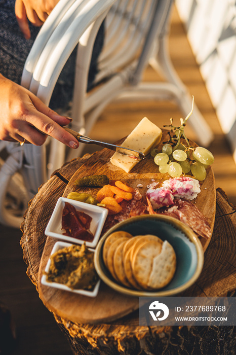 Cheese platter on a wooden stump