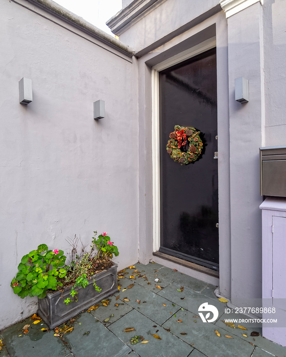 Notting hill, vintage house entrance door Christmas decorated, London United Kingdom