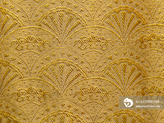 Gold floral ornament brocade textile pattern