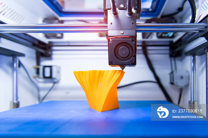 3D printer or additive manufacturing and robotic automation technology.