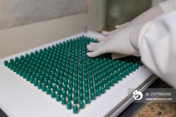 making green capsules. compounding pharmacy. compounding green medication.