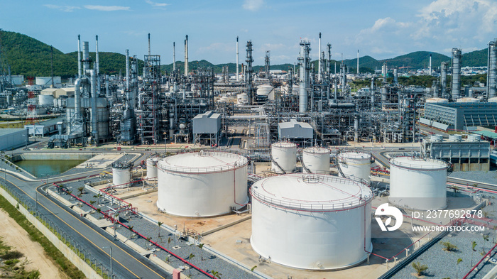 Aerial view oil refiner industry, White storage tank in refinery plant, Oil and Gads refinery factory.