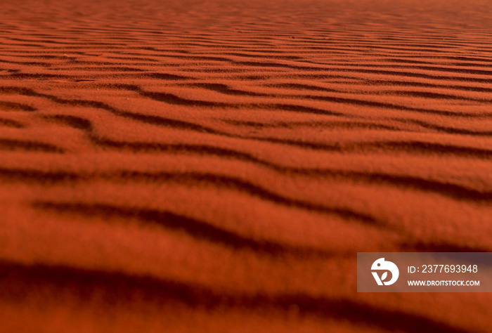 background of red sand on Wadi Rum in Jordan