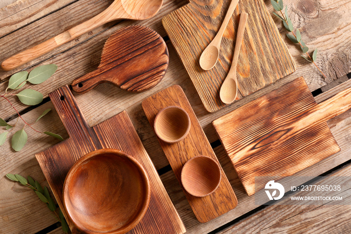 Set of wooden kitchenware on table